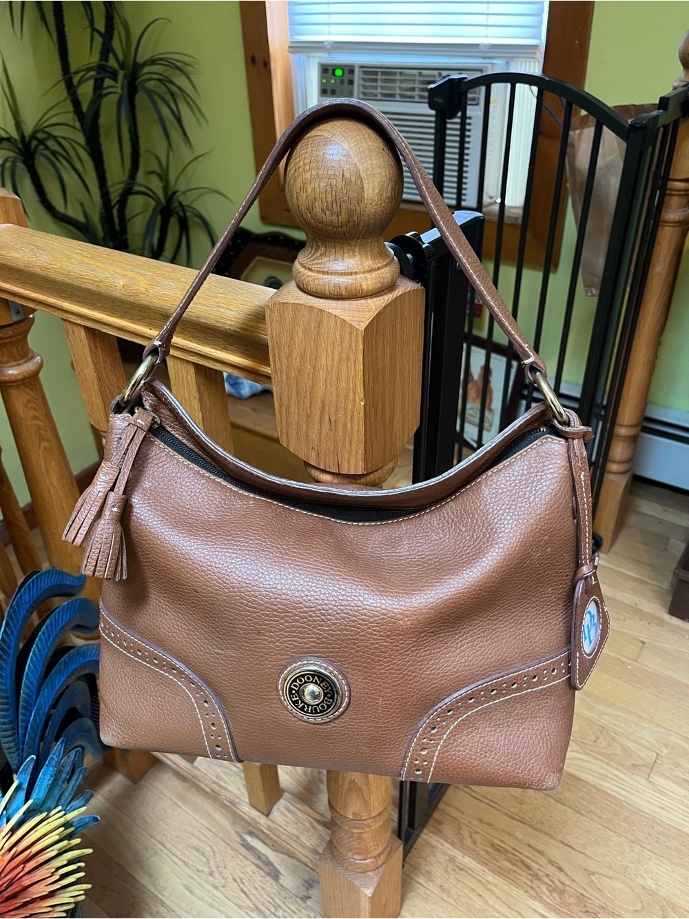 Dooney & Bourke Camel Brown Pebbled Leather Shoulder Bag with Tassel Emblem